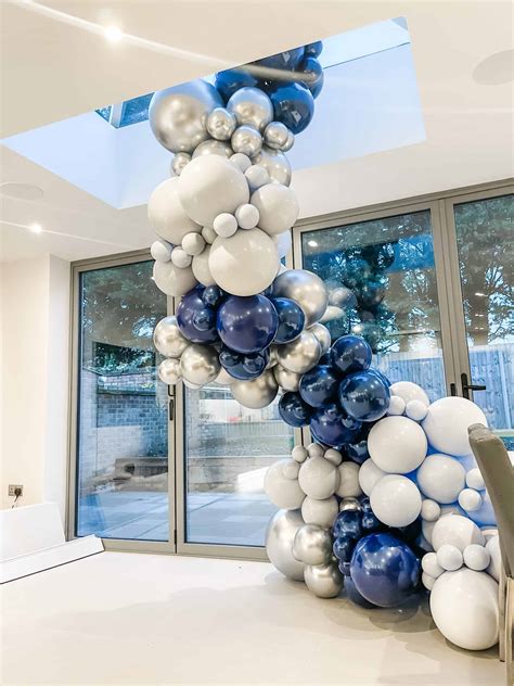 black and blue balloon garland|blue balloon garland ideas.